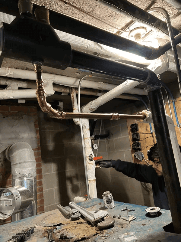 Man fixing pipe